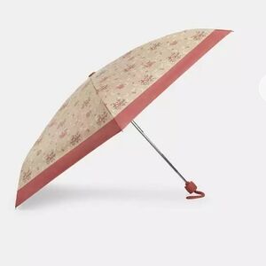 New Coach Signature Floral Pink Umbrella 99 Percent Uv Protection.